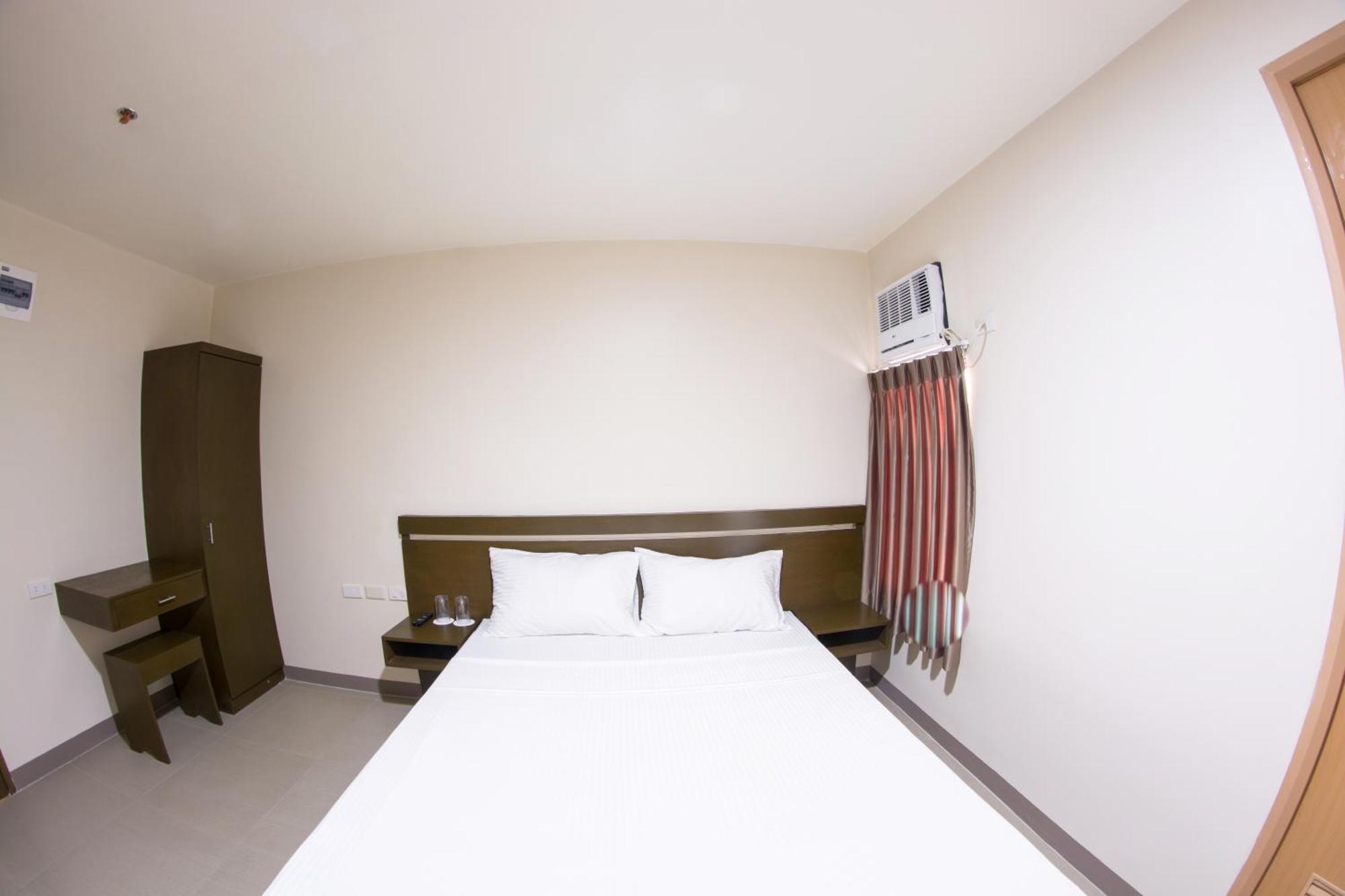 Emerald Suites Cdo Кагаян-де-Оро Номер фото