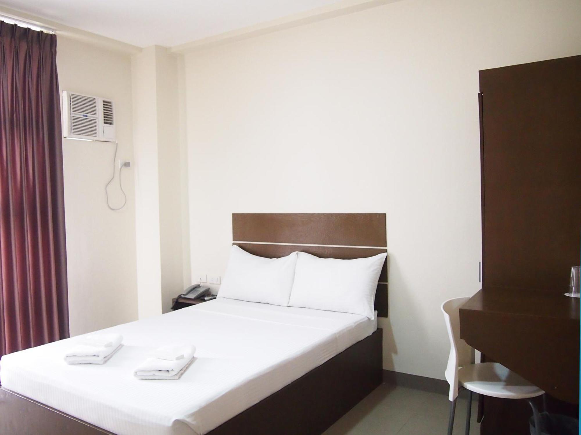 Emerald Suites Cdo Кагаян-де-Оро Номер фото