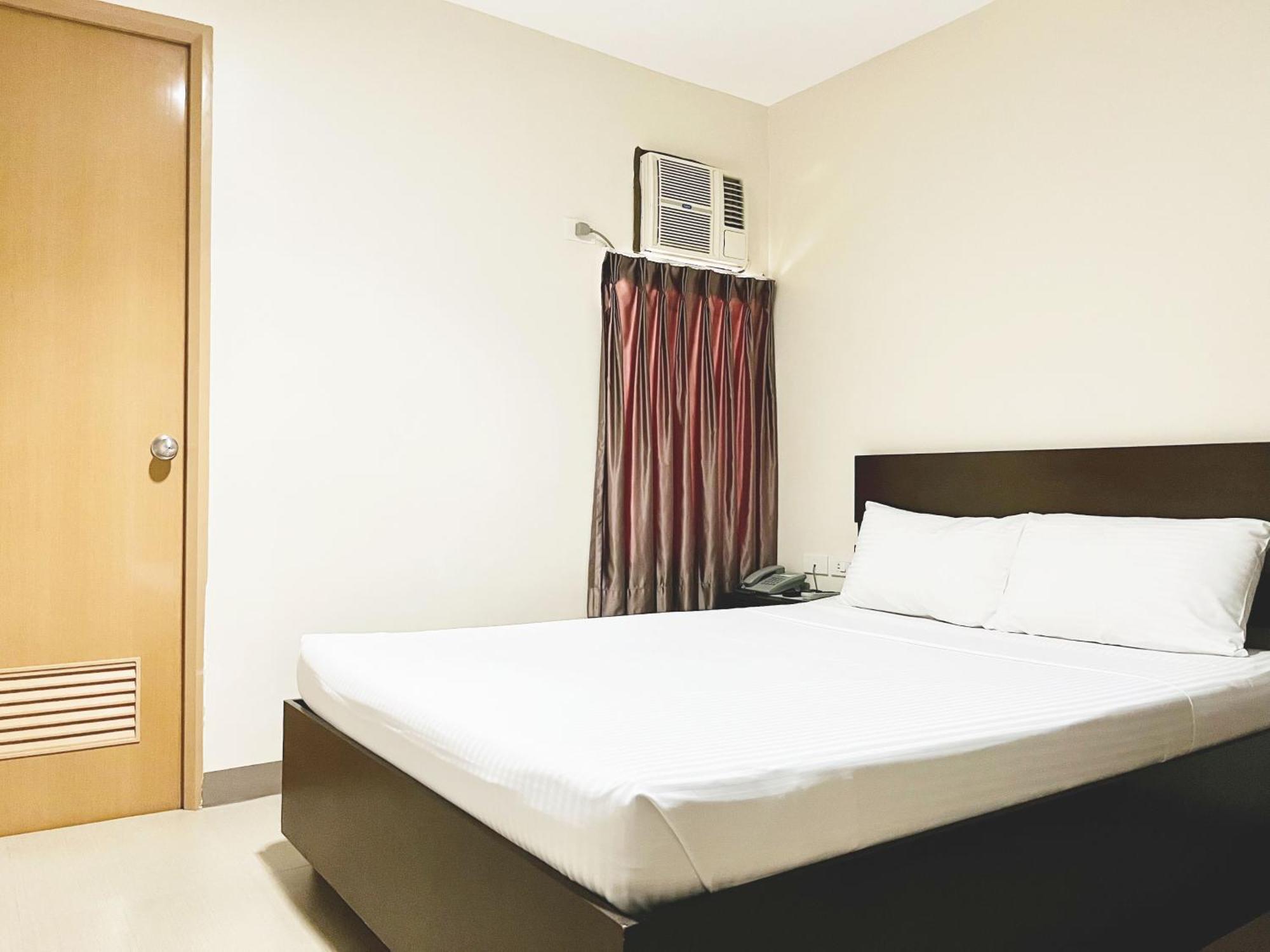 Emerald Suites Cdo Кагаян-де-Оро Номер фото