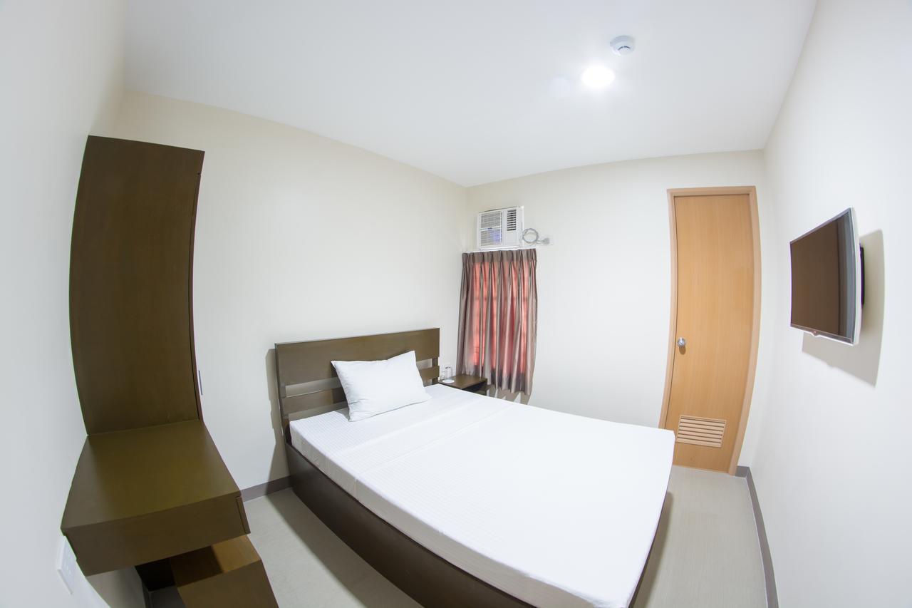 Emerald Suites Cdo Кагаян-де-Оро Номер фото