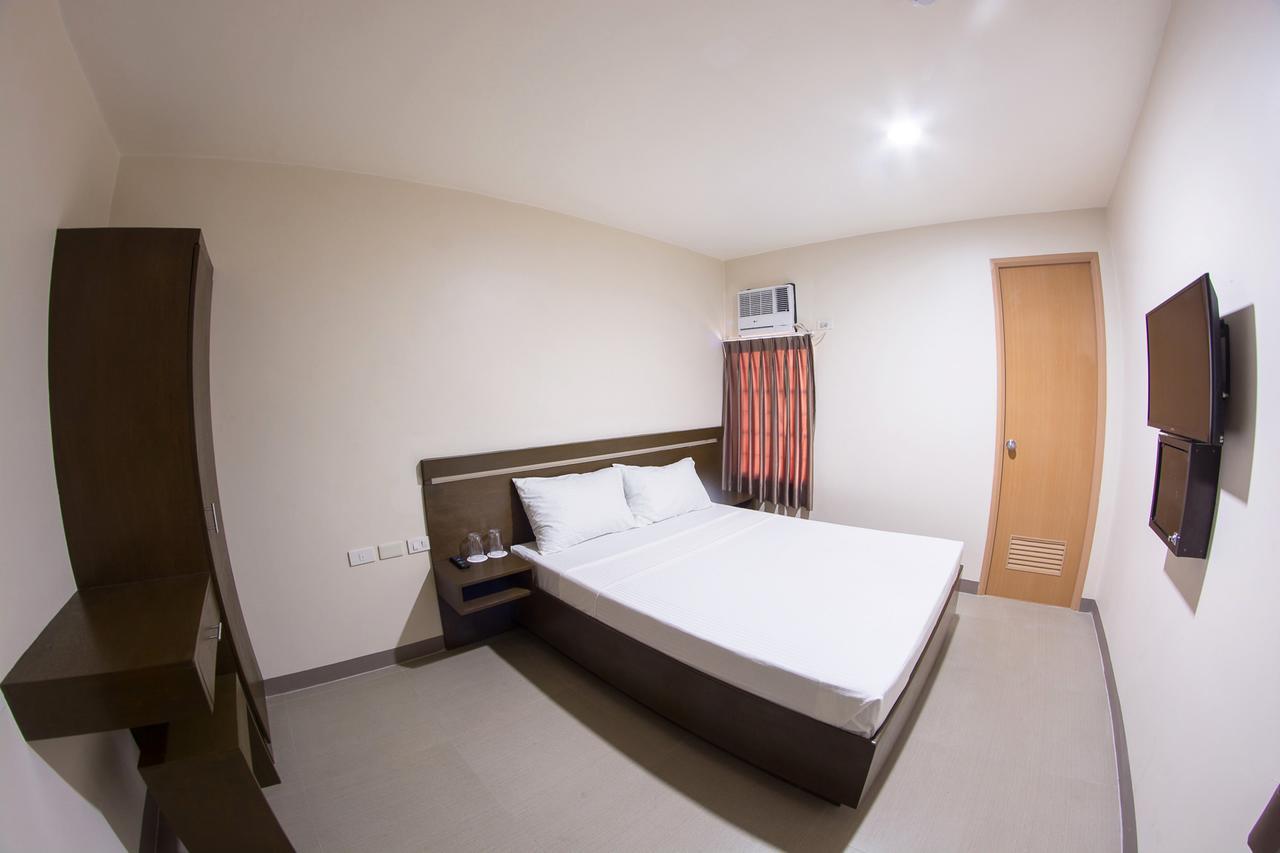 Emerald Suites Cdo Кагаян-де-Оро Номер фото