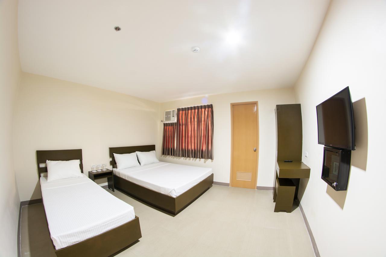 Emerald Suites Cdo Кагаян-де-Оро Номер фото